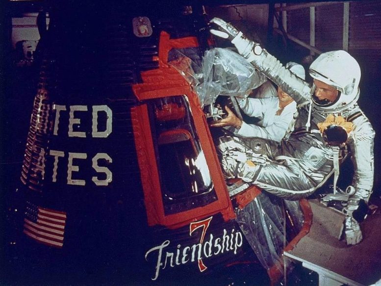 Astronaut John Glenn Squeezes Into Friendship 7 Capsule