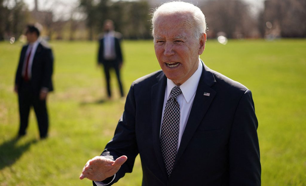 US President Joe Biden speaks to reporters upon arrival at Fort McNair in Washington, DC, on April 4.