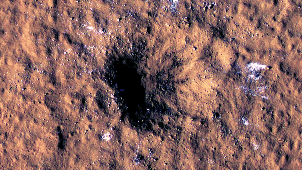 Afbeeldingen tonen een nieuwe krater op Mars veroorzaakt door een grote meteorietinslag